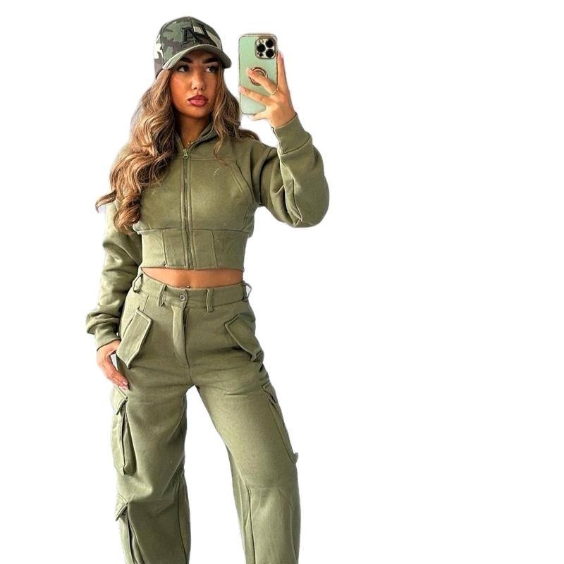 Model wearing KADIE Zip Up Cropped Top and cargo trouser tracksuit coord in beige outdoors
