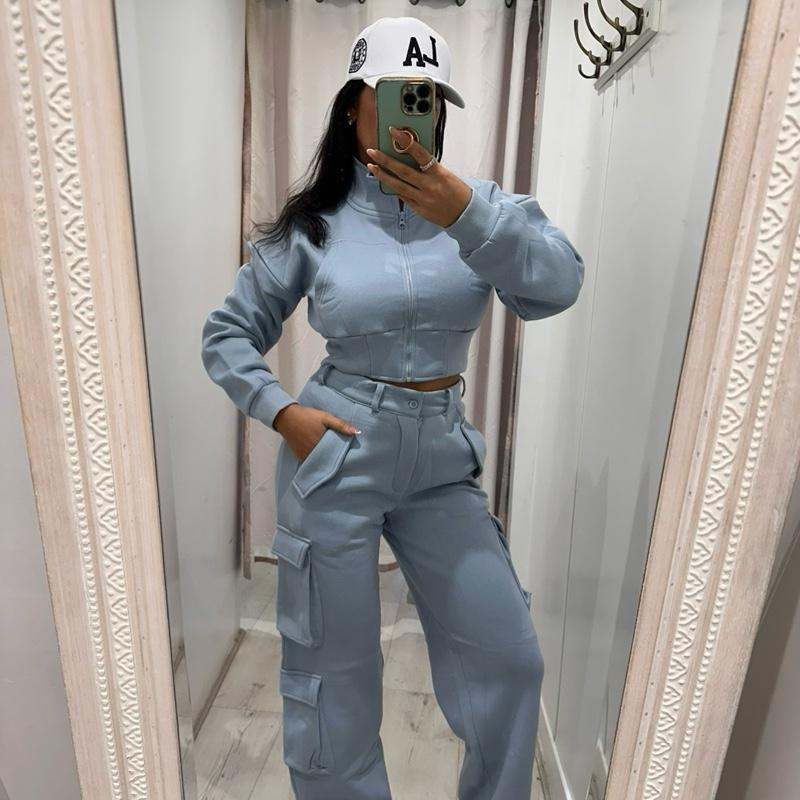 Woman wearing KADIE Zip Up Cropped Top and Cargo Trouser Tracksuit Coord in casual setting