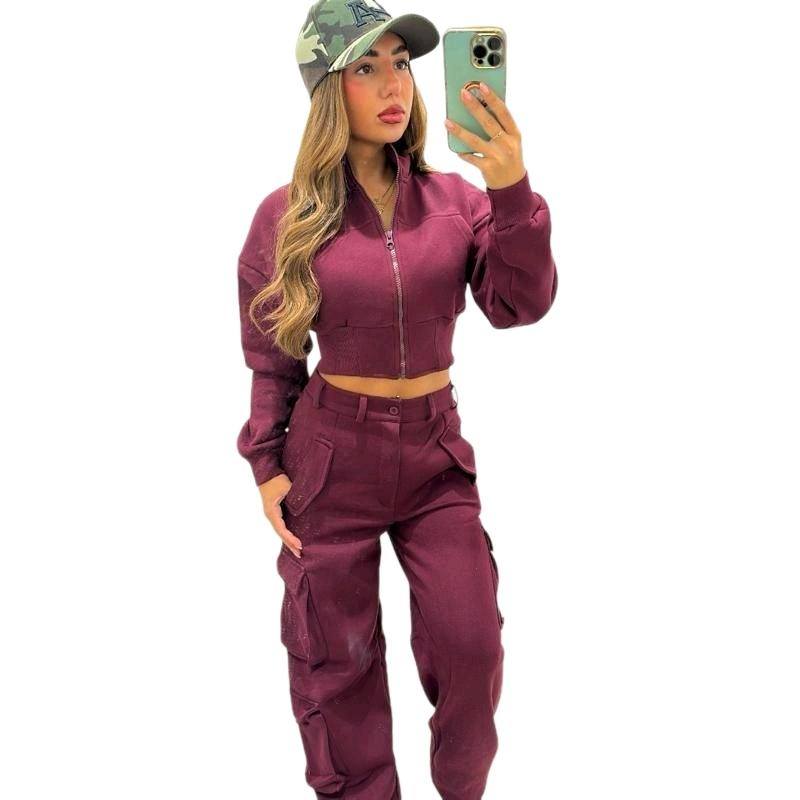 Woman wearing KADIE Zip Up Cropped Top and cargo trouser tracksuit set outdoors