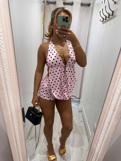 Woman wearing MYLA Two Piece polka dot short and halter neck top set, stylish and comfortable summer outfit