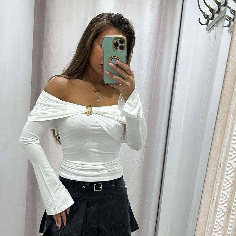 Women’s white AMAYA blouse, off-shoulder fit with gold accent buttons.