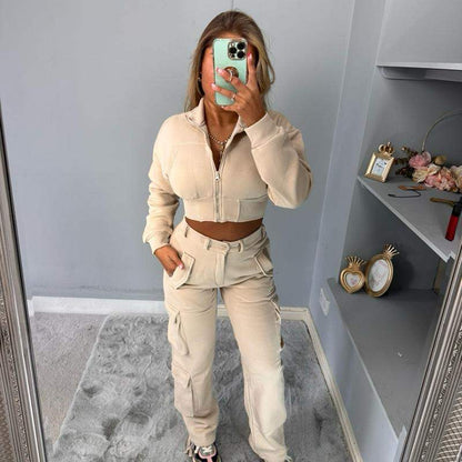 Woman wearing KADIE Zip Up Cropped Top and cargo trouser tracksuit in casual outdoor setting