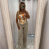 Woman wearing ADA beige flared jeans styled for casual comfort and fashion