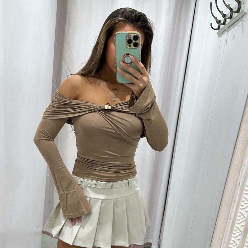 Light brown long sleeve AMAYA top with flared sleeves and gold button details.