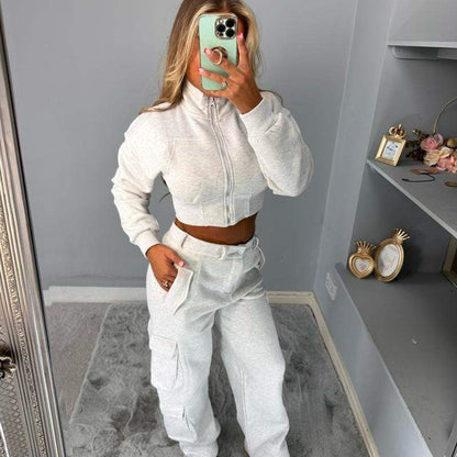 Woman wearing KADIE Zip Up Cropped Top with cargo trouser tracksuit outdoors