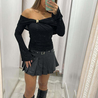Black AMAYA off-shoulder top with gold buttons and flared long sleeves.