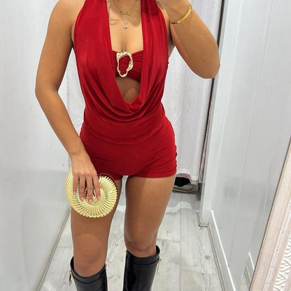 Red halter neck top with matching shorts and buckle detail, Ashton women’s set.