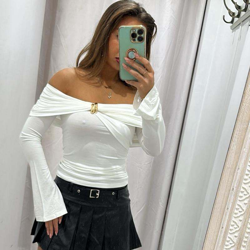 Women’s white AMAYA blouse, off-shoulder fit with gold accent buttons.